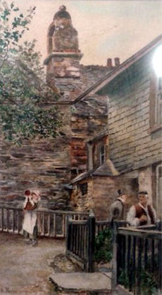 The old Town Hall in the background is partially obscured by the branches of a tree on one side and the slate-fronted building standing at right-angles to it in the foreground. A waistcoated man with a white shirt and cloth cap stands just inside the open gate in the heavy wooden fence surrounding the buildings, with a top-hatted figure behind him.